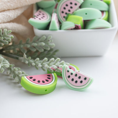 गुणवत्ता  Red Watermelon Shaped Silicone Beads Soft For Baby Teething फैक्टरी